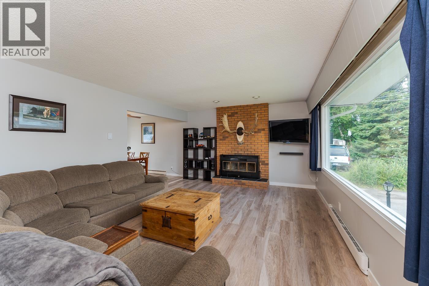 4183 Weisbrod Road, Prince George, BC - Indoor Photo Showing Living Room With Fireplace