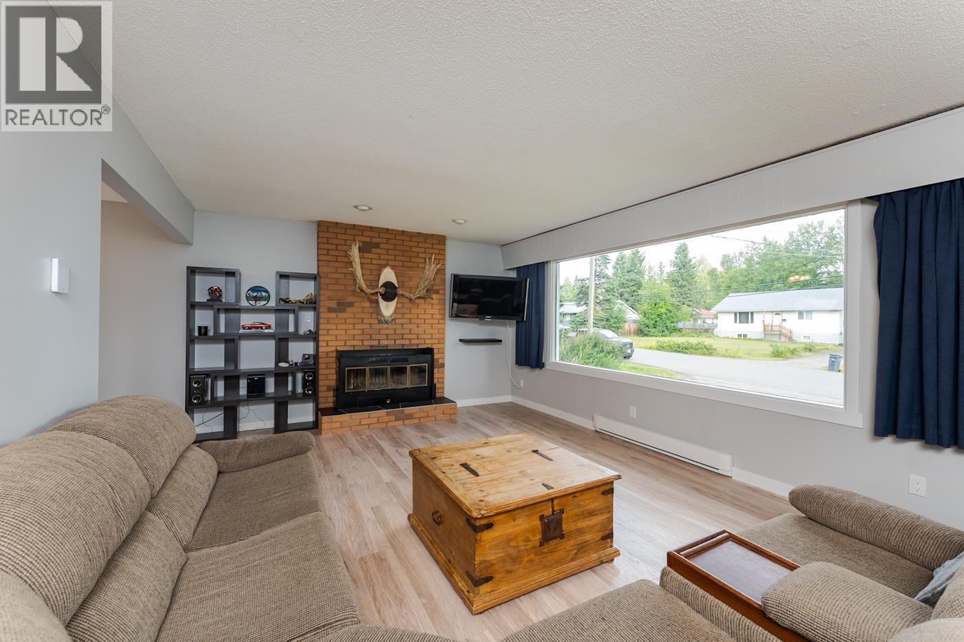 4183 Weisbrod Road, Prince George, BC - Indoor Photo Showing Living Room With Fireplace