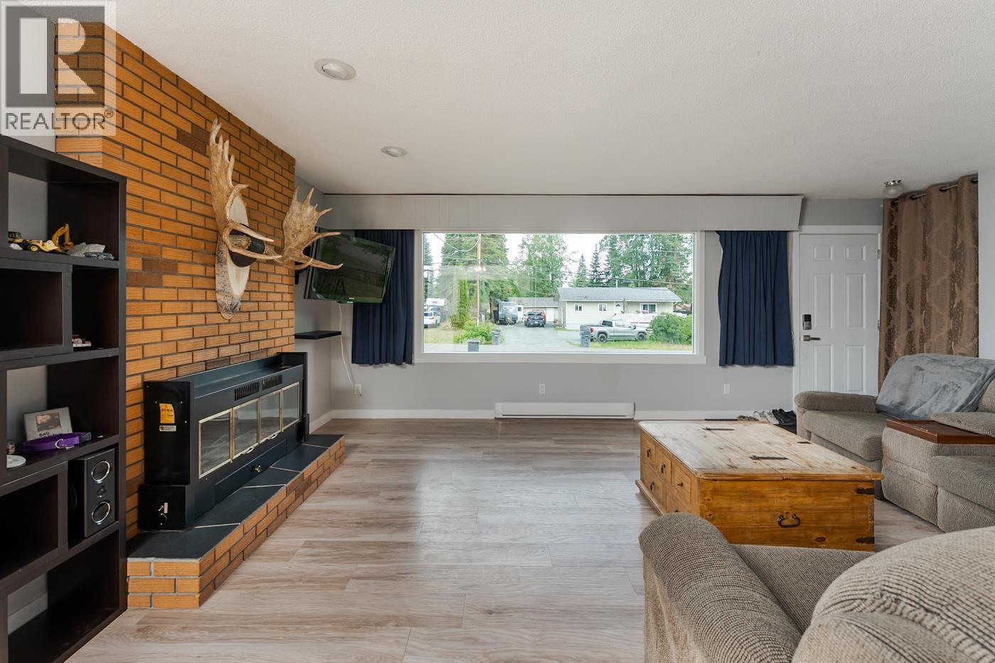 4183 Weisbrod Road, Prince George, BC - Indoor Photo Showing Living Room With Fireplace