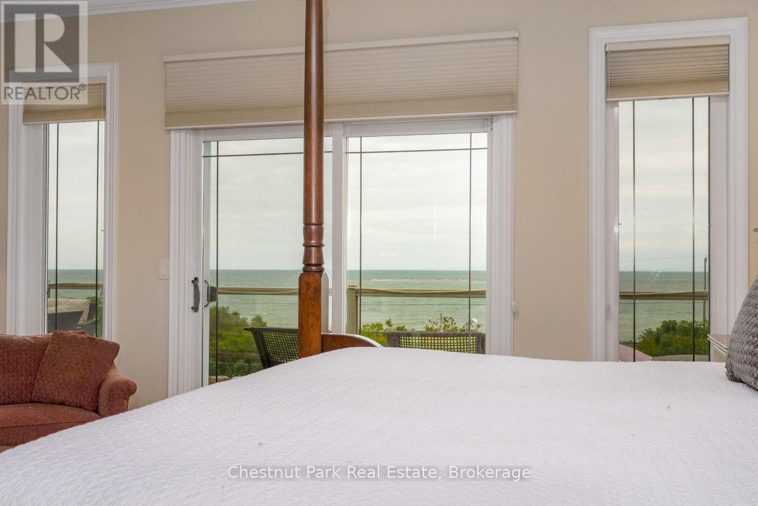What a view to wake up to - 133 Lakeshore Road E, Blue Mountains, ON - Indoor Photo Showing Bedroom