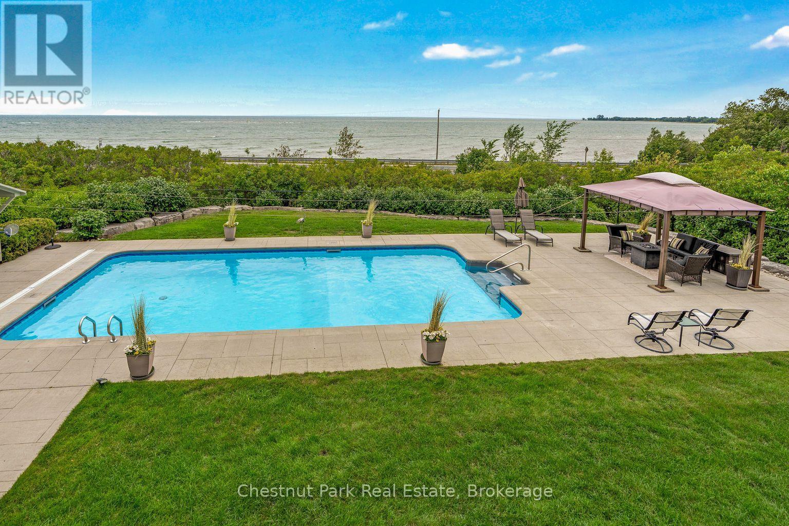 Salt water pool - 133 Lakeshore Road E, Blue Mountains, ON - Outdoor With In Ground Pool With Deck Patio Veranda With Backyard
