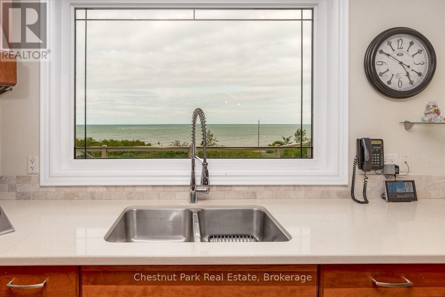 OH the view - 133 Lakeshore Road E, Blue Mountains, ON - Indoor Photo Showing Kitchen With Double Sink