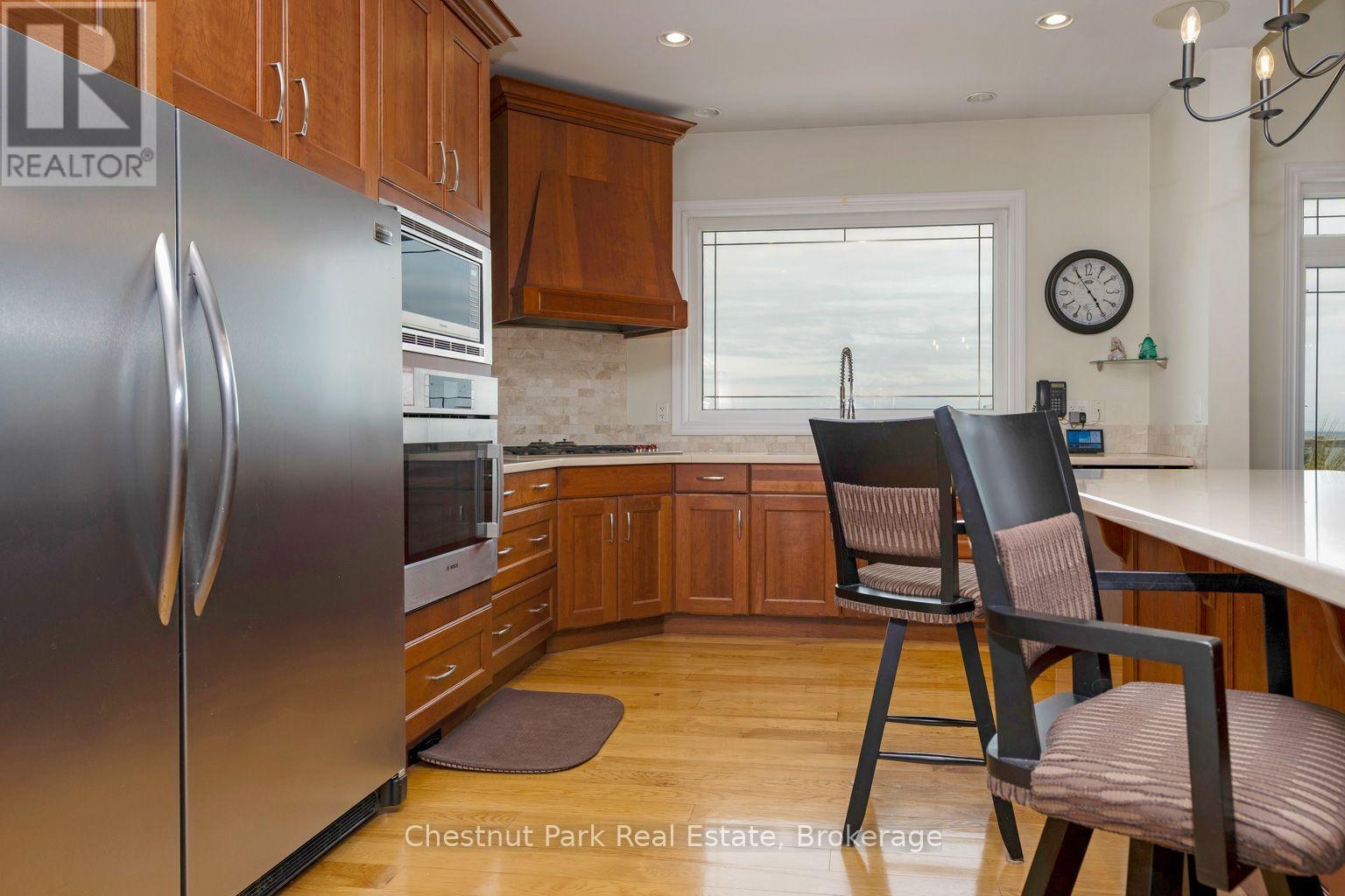 Large custom kitchen - 133 Lakeshore Road E, Blue Mountains, ON - Indoor Photo Showing Kitchen