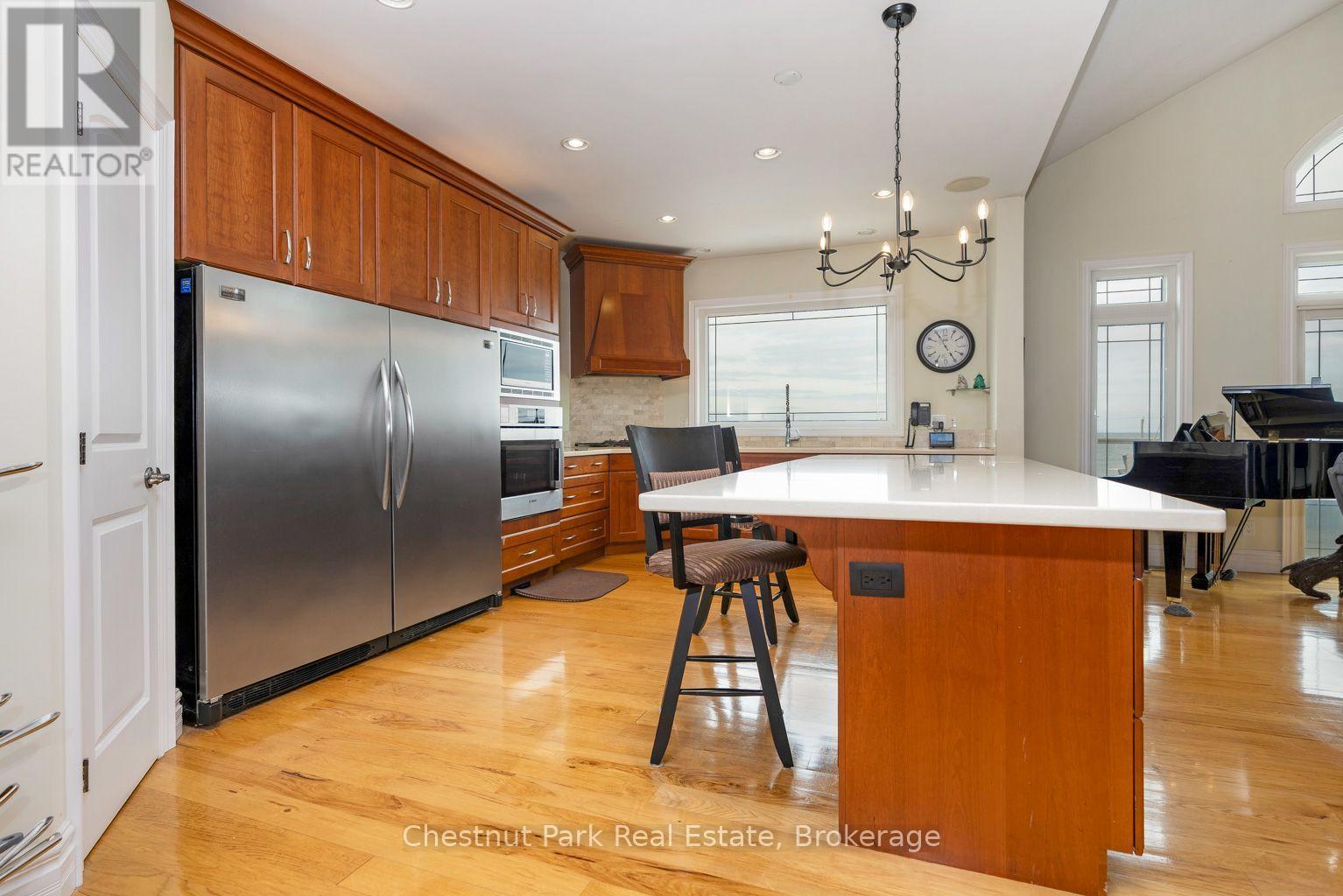 Look at that island! - 133 Lakeshore Road E, Blue Mountains, ON - Indoor Photo Showing Kitchen