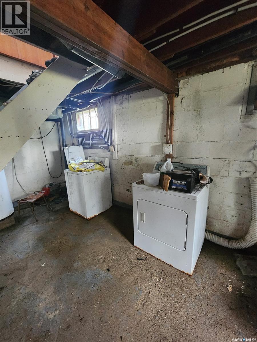 215 Menzies Street, North Portal, SK - Indoor Photo Showing Basement