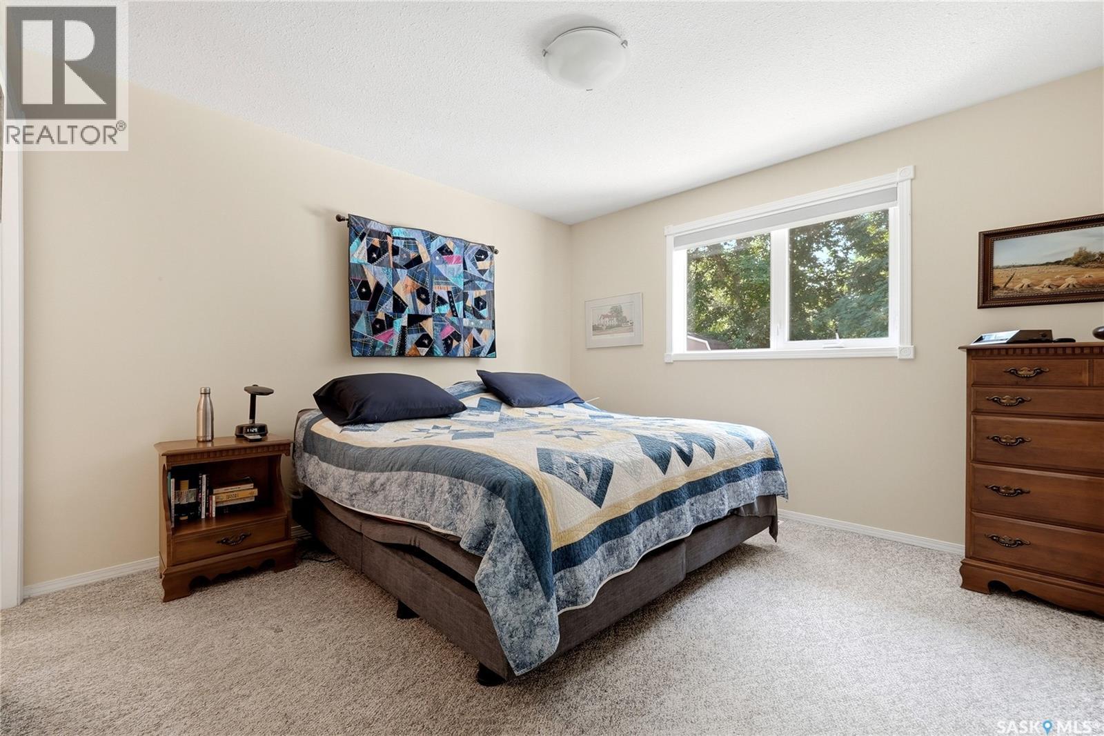 28 Rosedale Avenue, Katepwa Beach, SK - Indoor Photo Showing Bedroom