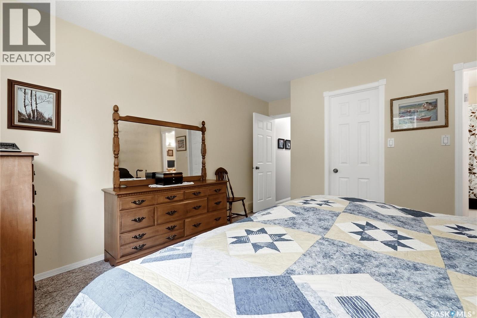 28 Rosedale Avenue, Katepwa Beach, SK - Indoor Photo Showing Bedroom