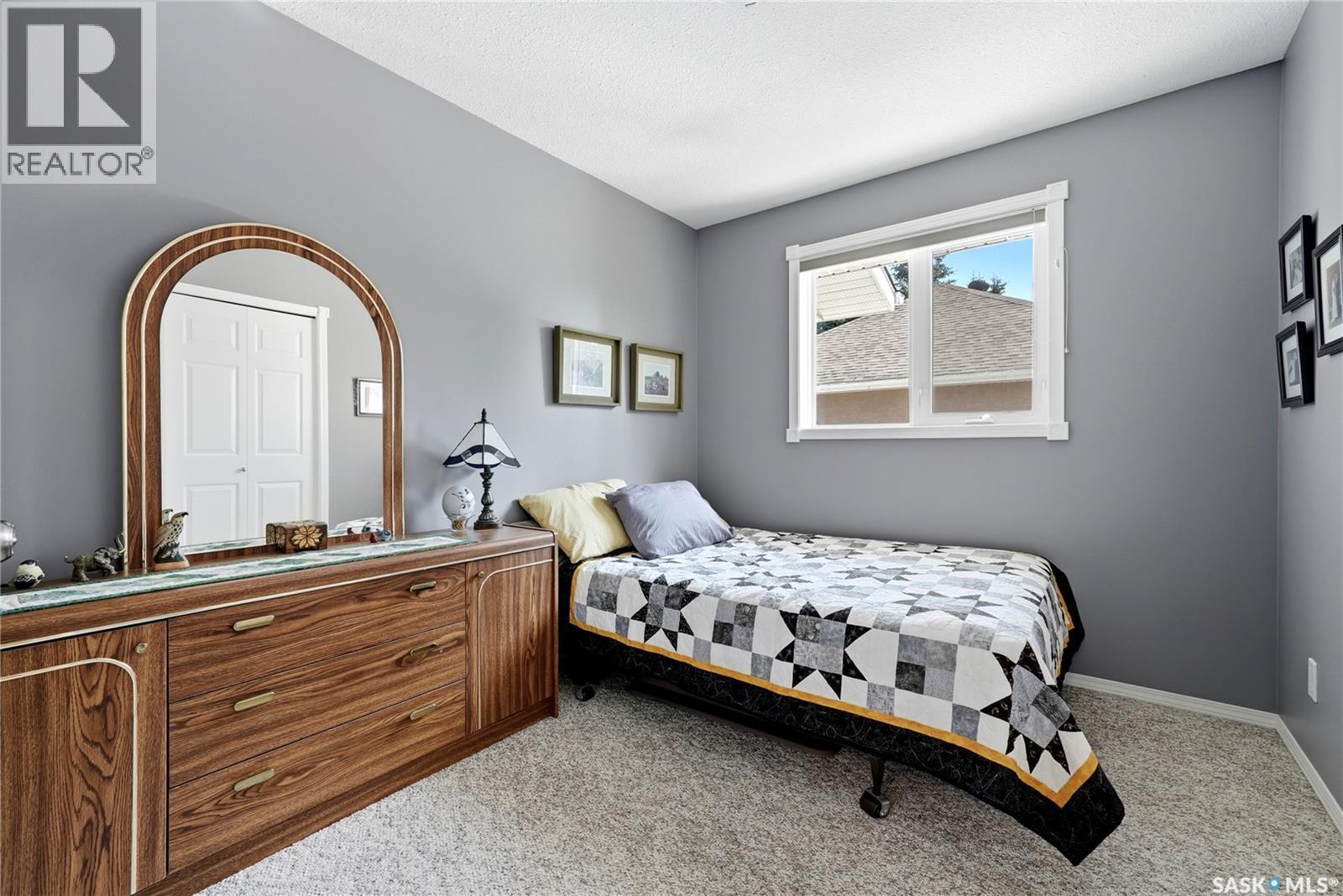 28 Rosedale Avenue, Katepwa Beach, SK - Indoor Photo Showing Bedroom