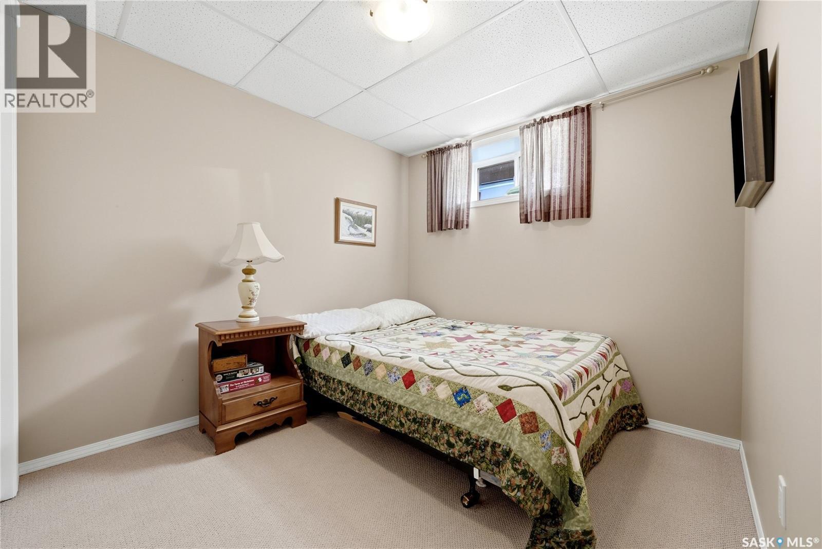28 Rosedale Avenue, Katepwa Beach, SK - Indoor Photo Showing Bedroom