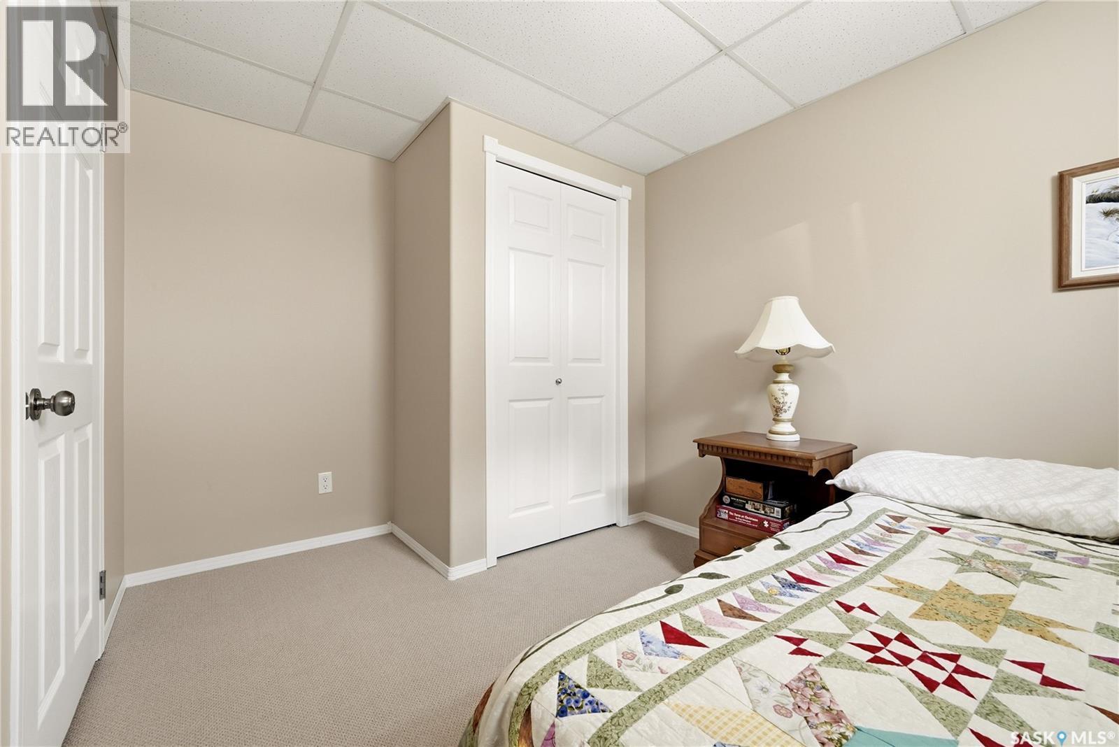28 Rosedale Avenue, Katepwa Beach, SK - Indoor Photo Showing Bedroom