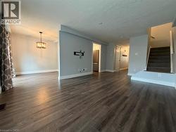 Spacious interior featuring wood-finish flooring throughout -