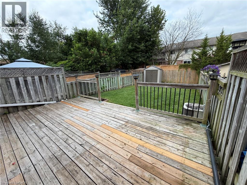 Expansive wooden deck with railing and balusters - 41 Edgemere Drive, Cambridge, ON - Outdoor With Deck Patio Veranda