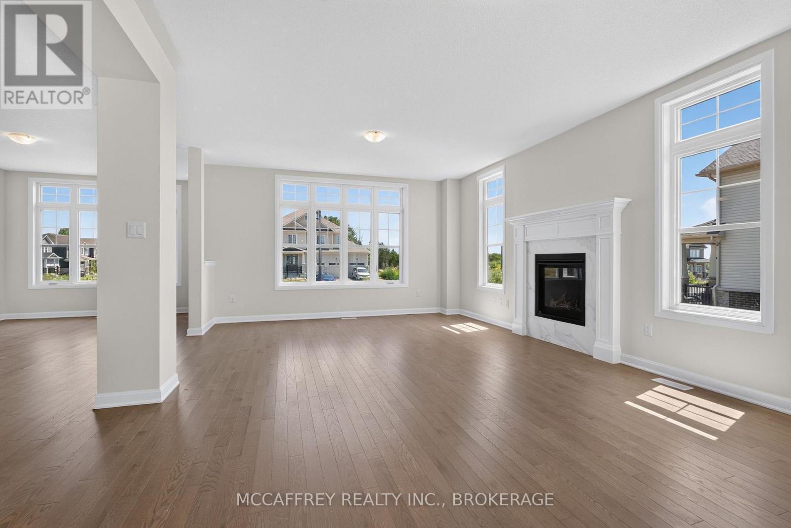 103 Gildersleeve Boulevard, Loyalist (Bath), ON - Indoor Photo Showing Living Room With Fireplace