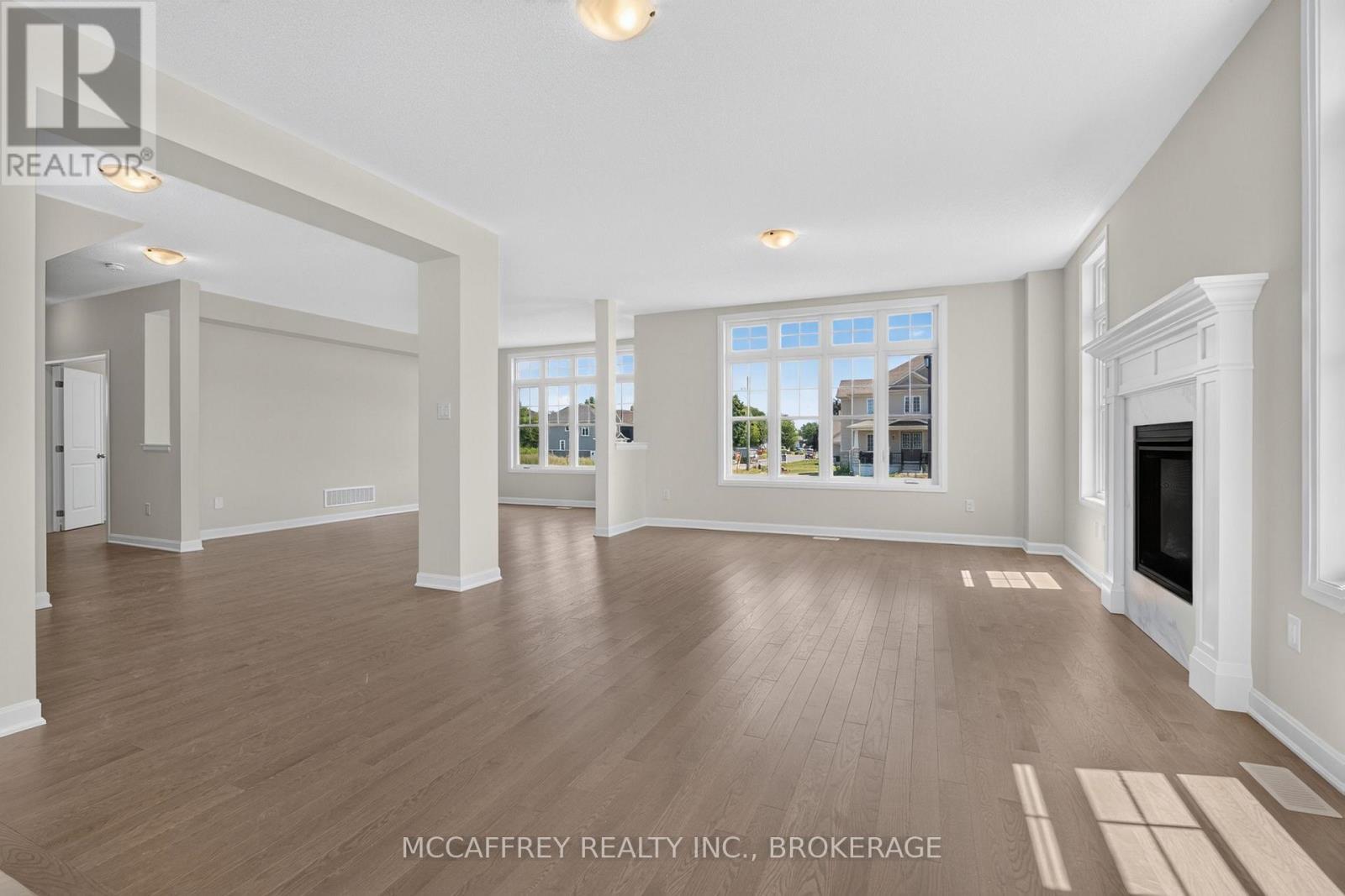 103 Gildersleeve Boulevard, Loyalist (Bath), ON - Indoor Photo Showing Living Room With Fireplace