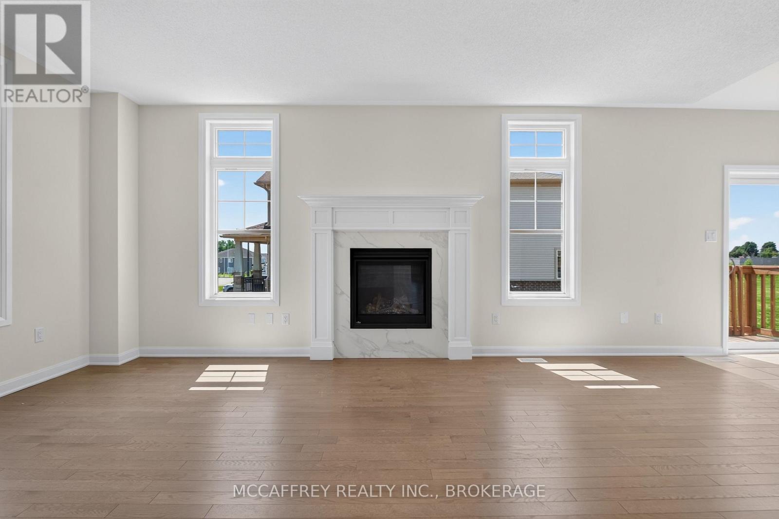 103 Gildersleeve Boulevard, Loyalist (Bath), ON - Indoor Photo Showing Living Room With Fireplace