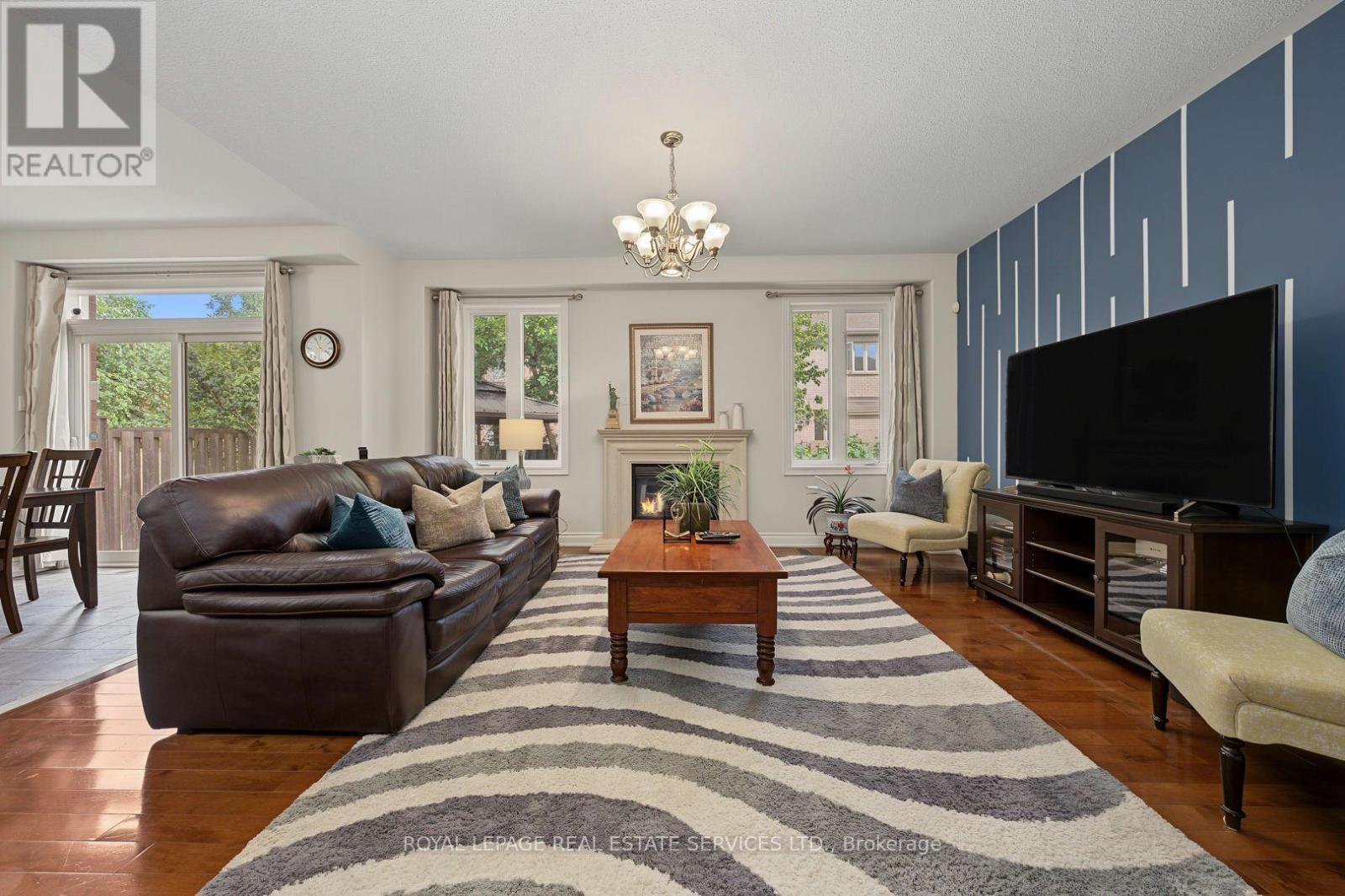3368 Raspberry Bush Trail, Oakville, ON - Indoor Photo Showing Living Room With Fireplace