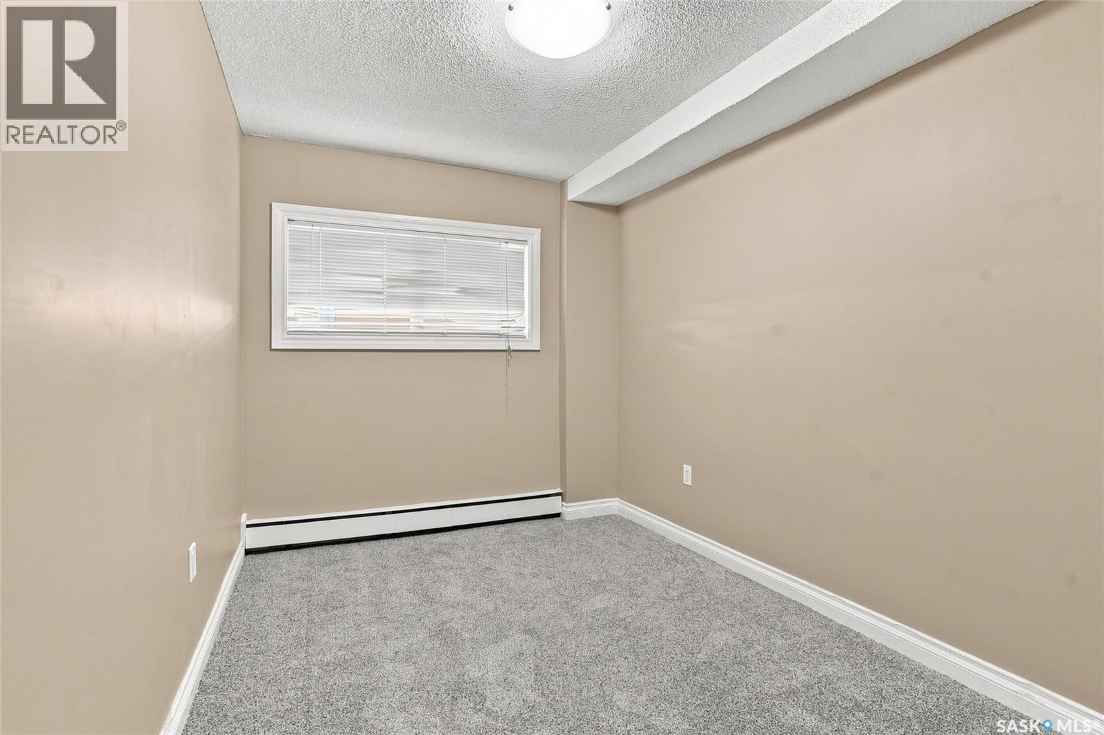 8 104 104Th Street W, Saskatoon, SK - Indoor Photo Showing Other Room