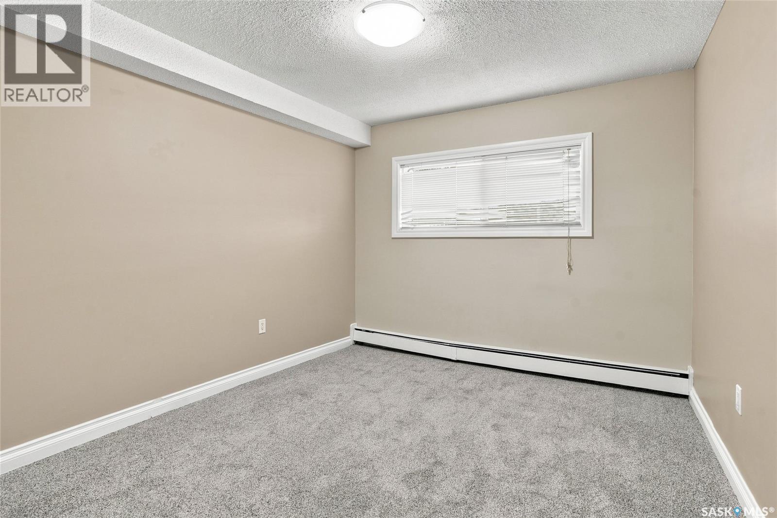 8 104 104Th Street W, Saskatoon, SK - Indoor Photo Showing Other Room