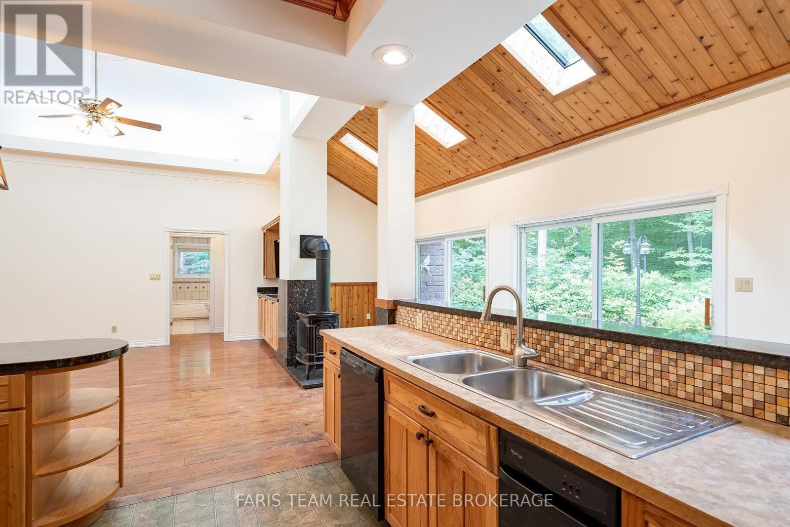 105 Copeland Creek Drive, Tiny, ON - Indoor Photo Showing Kitchen With Double Sink