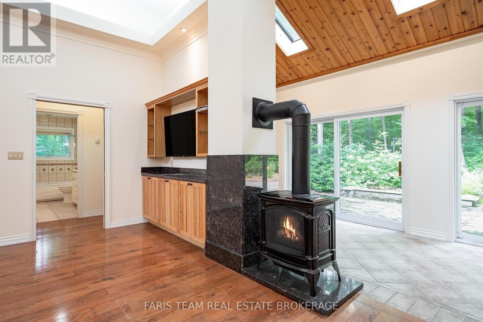 105 Copeland Creek Drive, Tiny, ON - Indoor With Fireplace