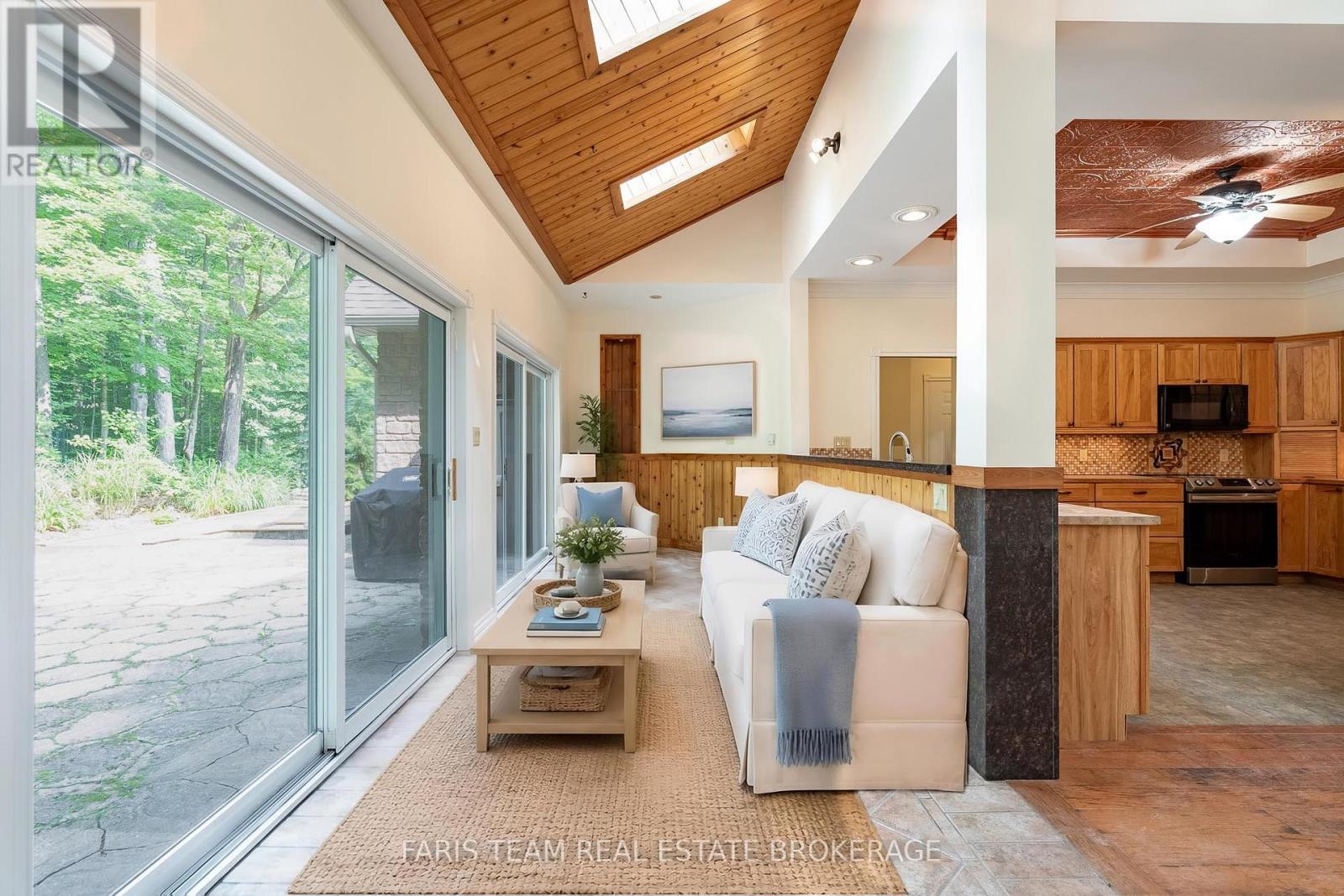 Virtually Staged - 105 Copeland Creek Drive, Tiny, ON - Indoor Photo Showing Living Room
