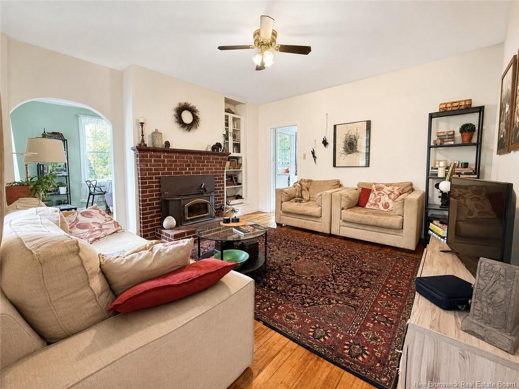 115-123 Pond Shore Rd, Sackville, NB - Indoor Photo Showing Living Room With Fireplace