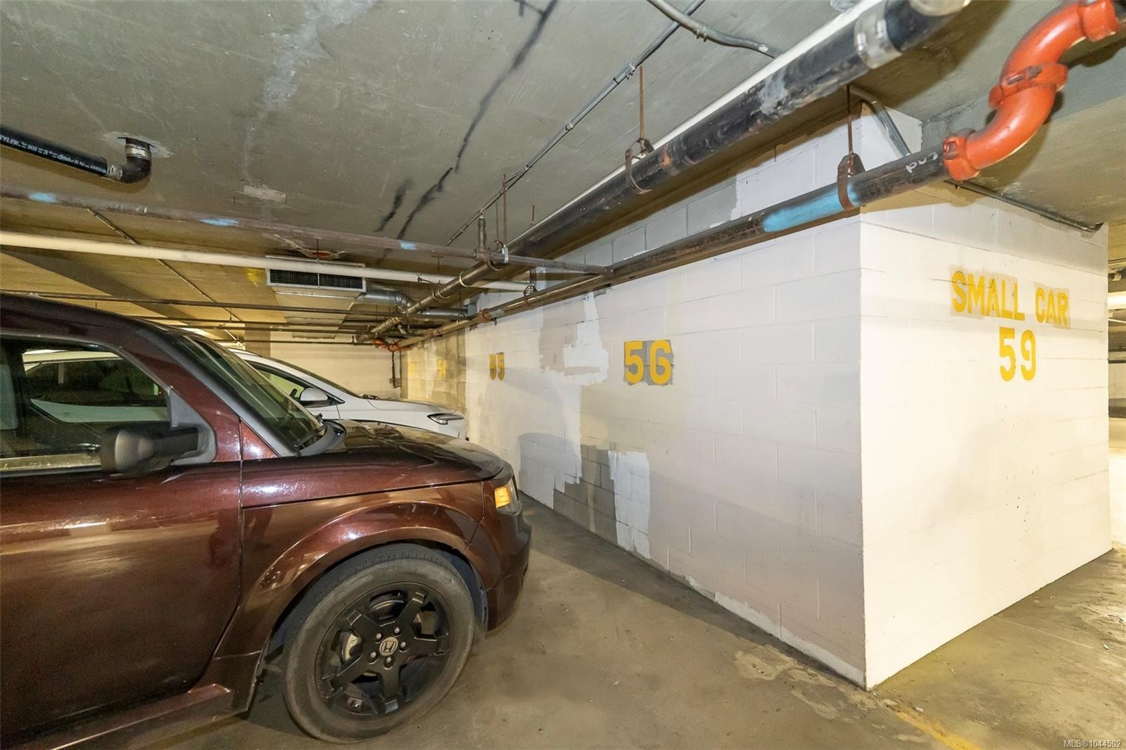 #104-2757 Quadra St, Victoria, BC - Indoor Photo Showing Garage