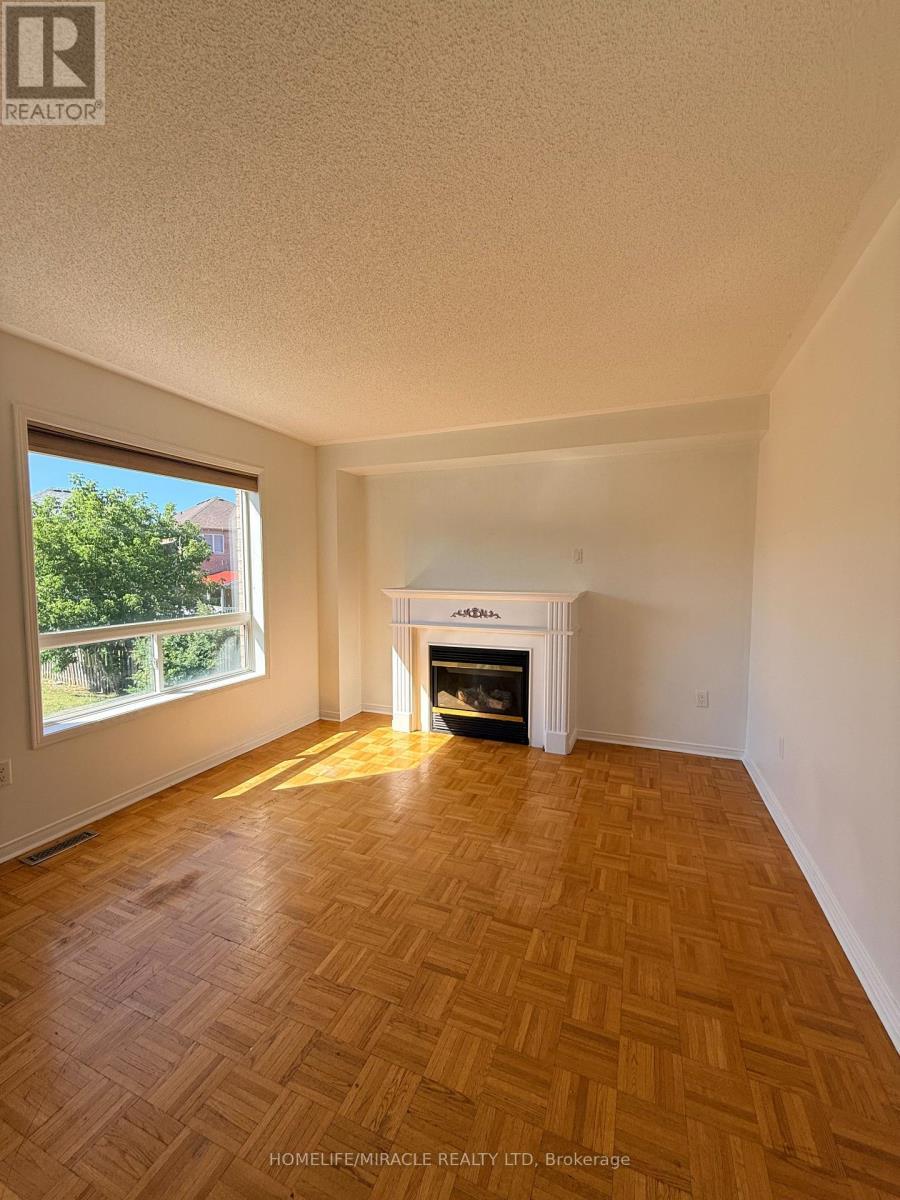 102 Misty Hills Trail, Toronto, ON - Indoor Photo Showing Living Room With Fireplace