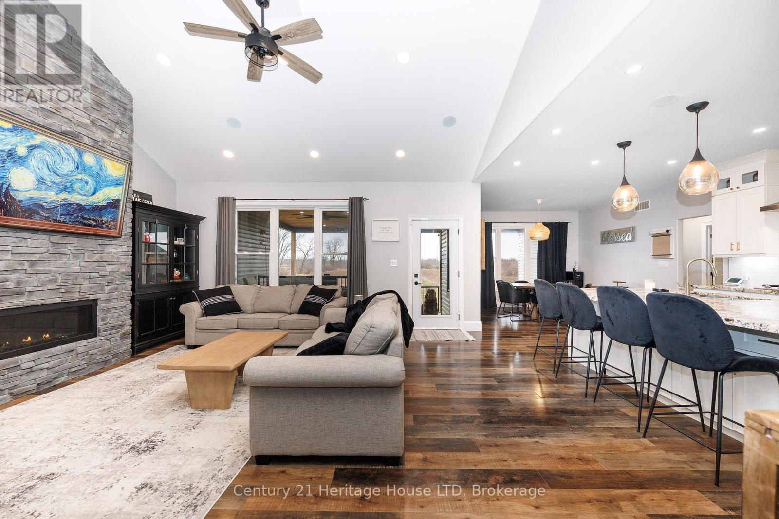 Main Living Area with Walk-out to Covered Deck - 856 Lorraine Road, Port Colborne (Sherkston), ON - Indoor Photo Showing Living Room With Fireplace