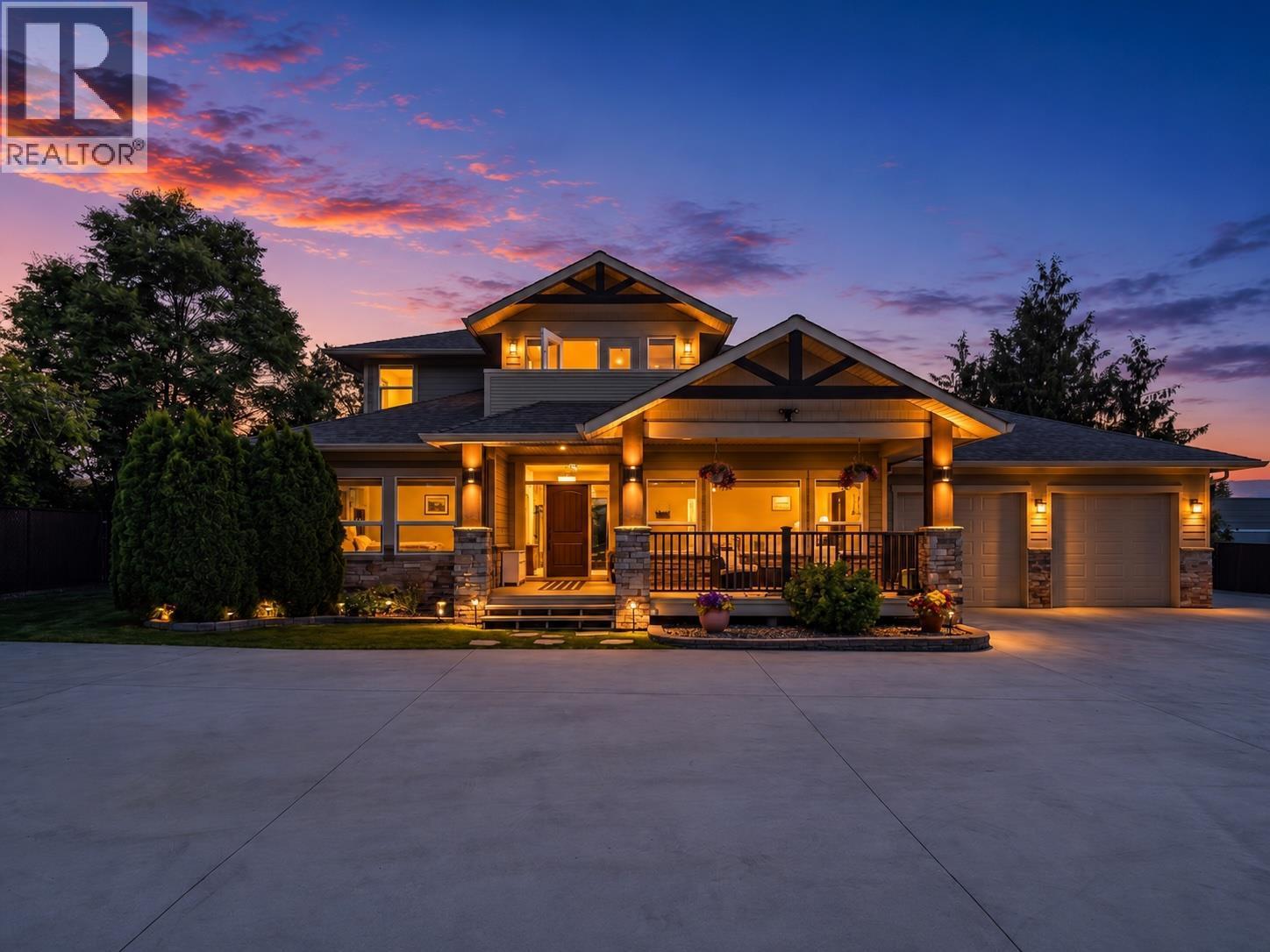 4588 Raymer Road, Kelowna, BC - Outdoor With Deck Patio Veranda With Facade