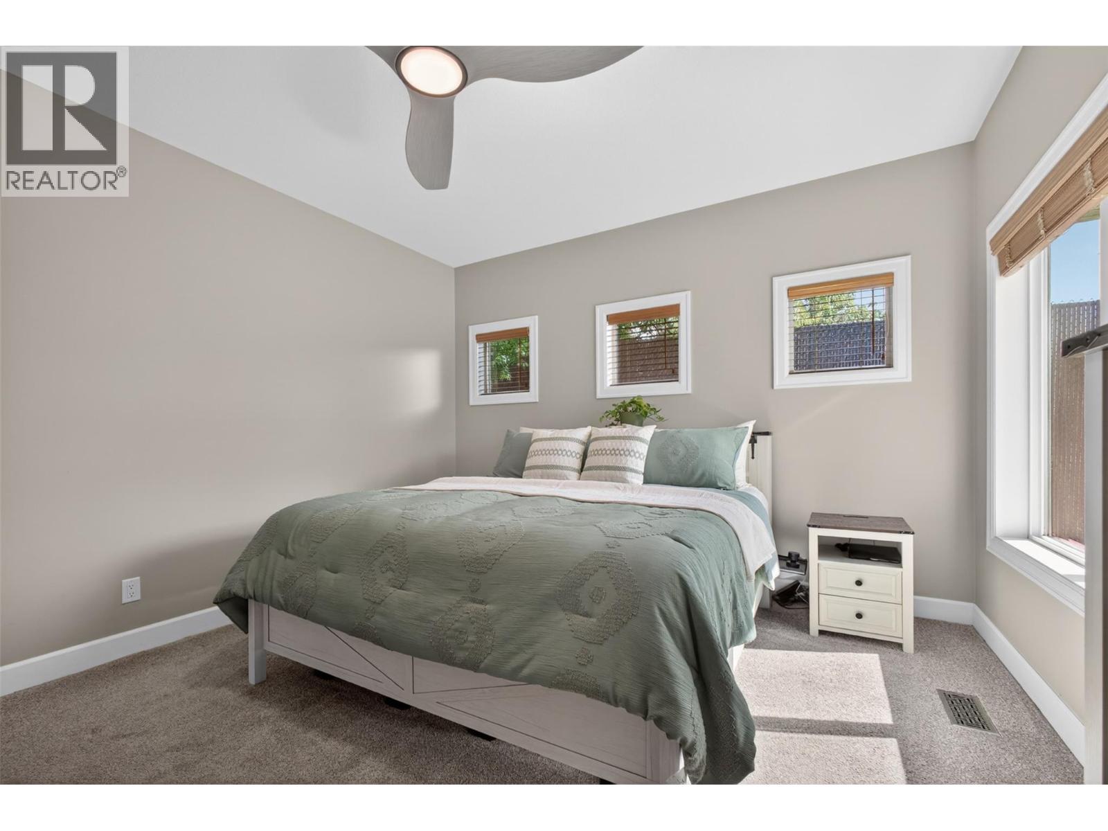 primary - 4588 Raymer Road, Kelowna, BC - Indoor Photo Showing Bedroom