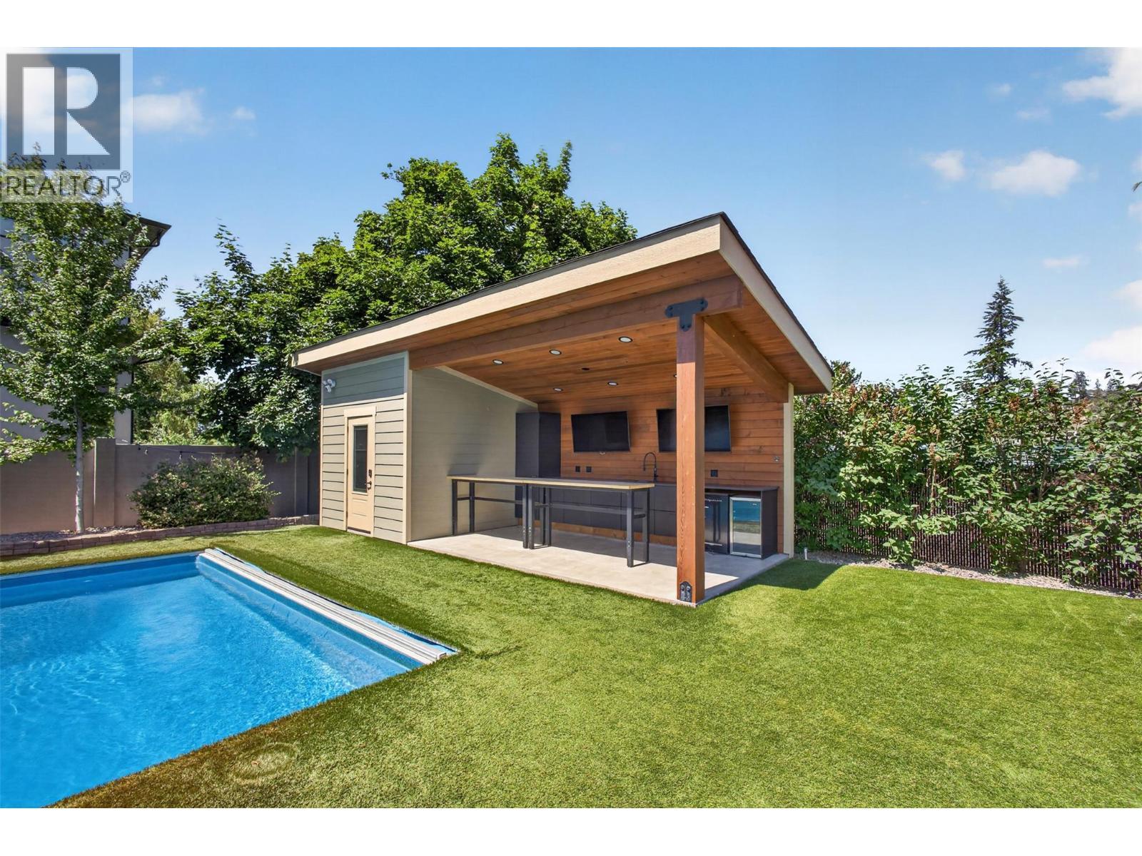 4588 Raymer Road, Kelowna, BC - Outdoor With In Ground Pool With Deck Patio Veranda