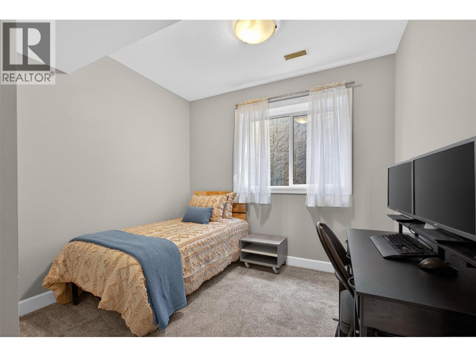 main basement bedroom - 4588 Raymer Road, Kelowna, BC - Indoor Photo Showing Bedroom