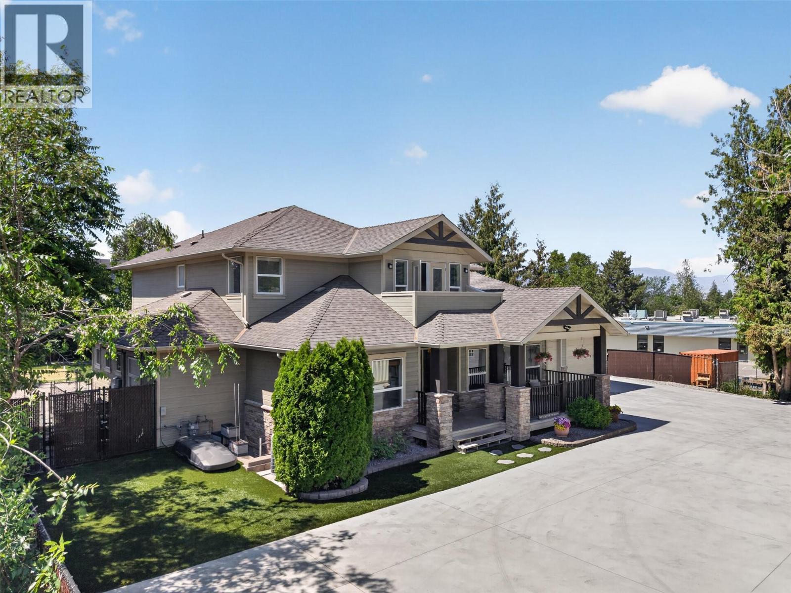 4588 Raymer Road, Kelowna, BC - Outdoor With Facade