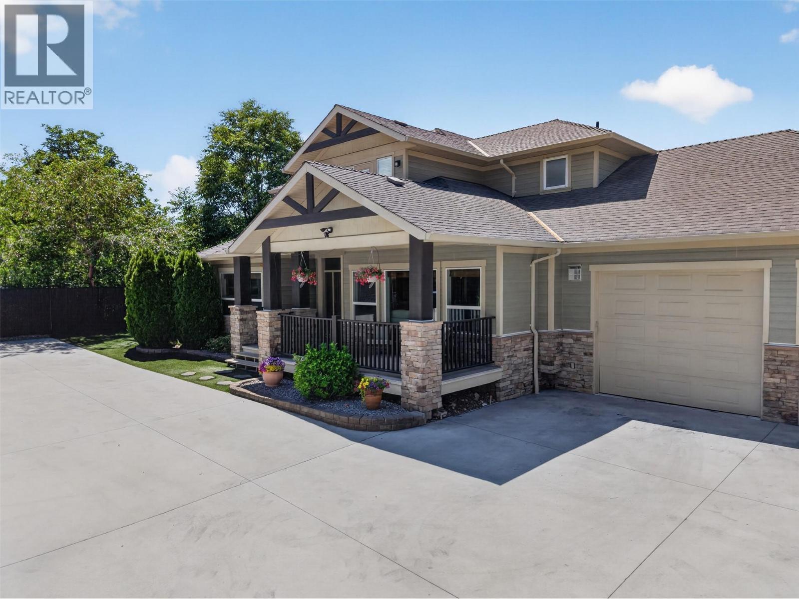 4588 Raymer Road, Kelowna, BC - Outdoor With Facade