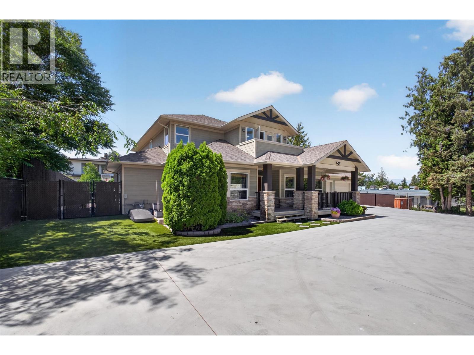 4588 Raymer Road, Kelowna, BC - Outdoor With Facade