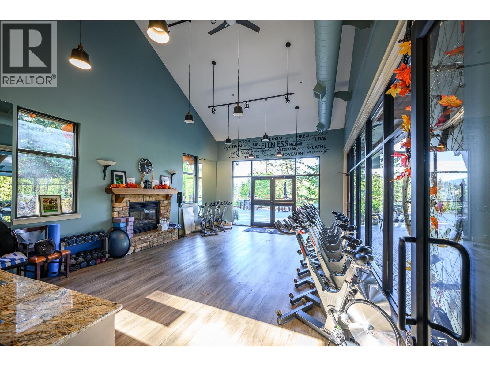 333 Longspoon Drive Unit# 19, Vernon, BC - Indoor With Fireplace
