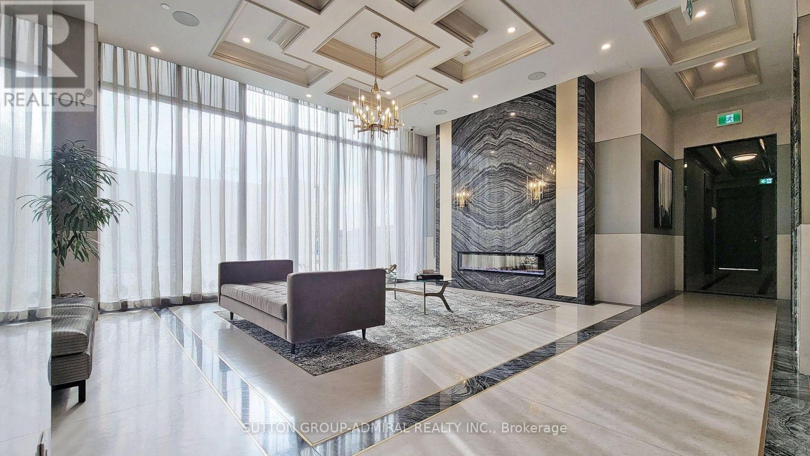 913 - 10 Gatineau Drive, Vaughan, ON - Indoor Photo Showing Other Room With Fireplace