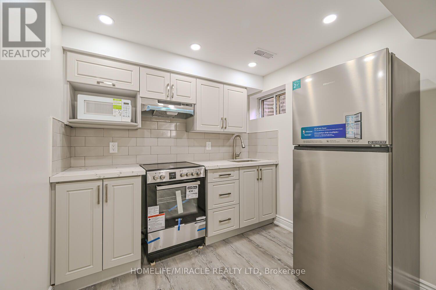 125 - 6466 Finch Avenue W, Toronto, ON - Indoor Photo Showing Kitchen
