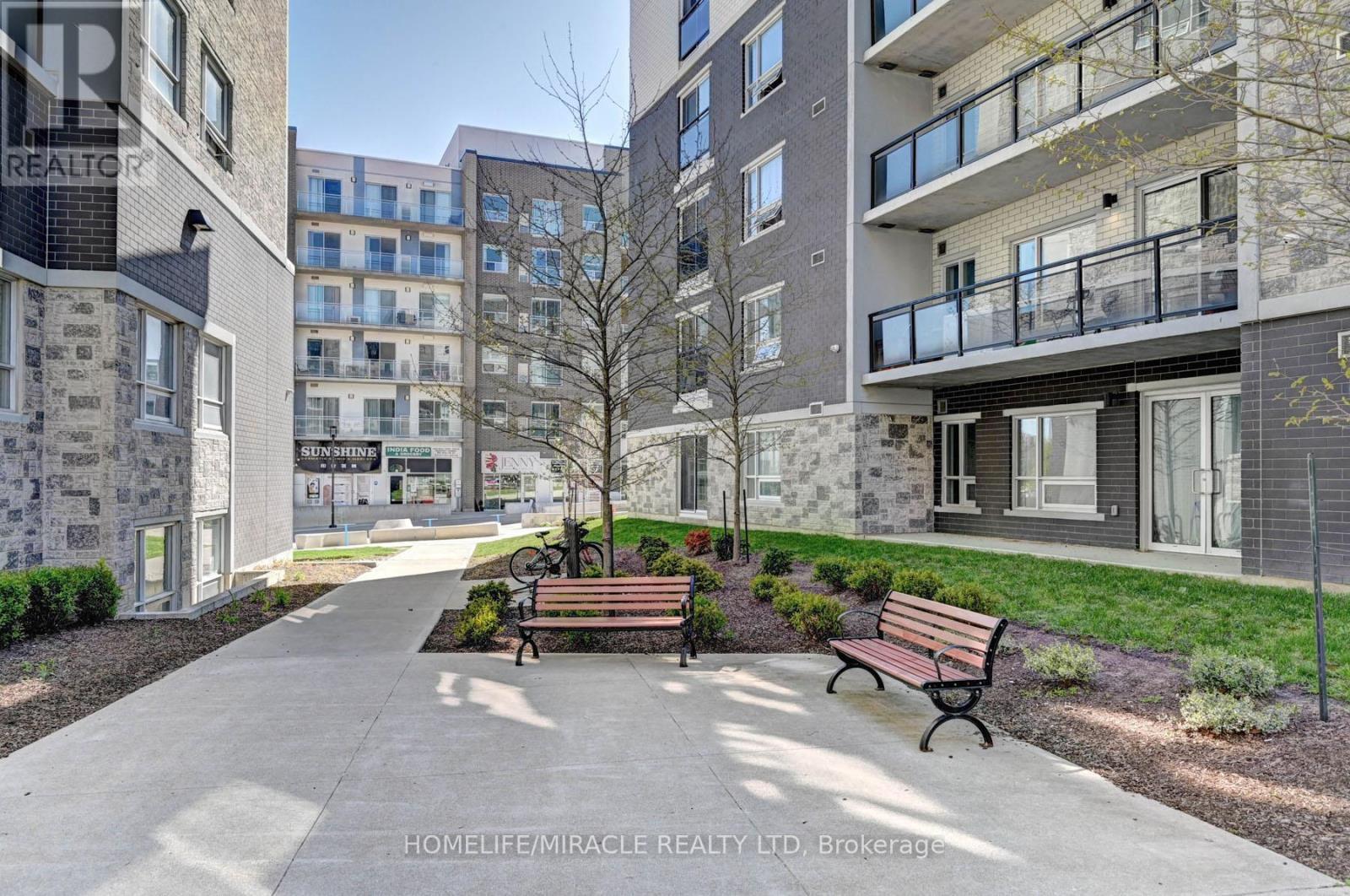 209F - 275 Larch Street, Waterloo, ON - Outdoor With Balcony With Facade
