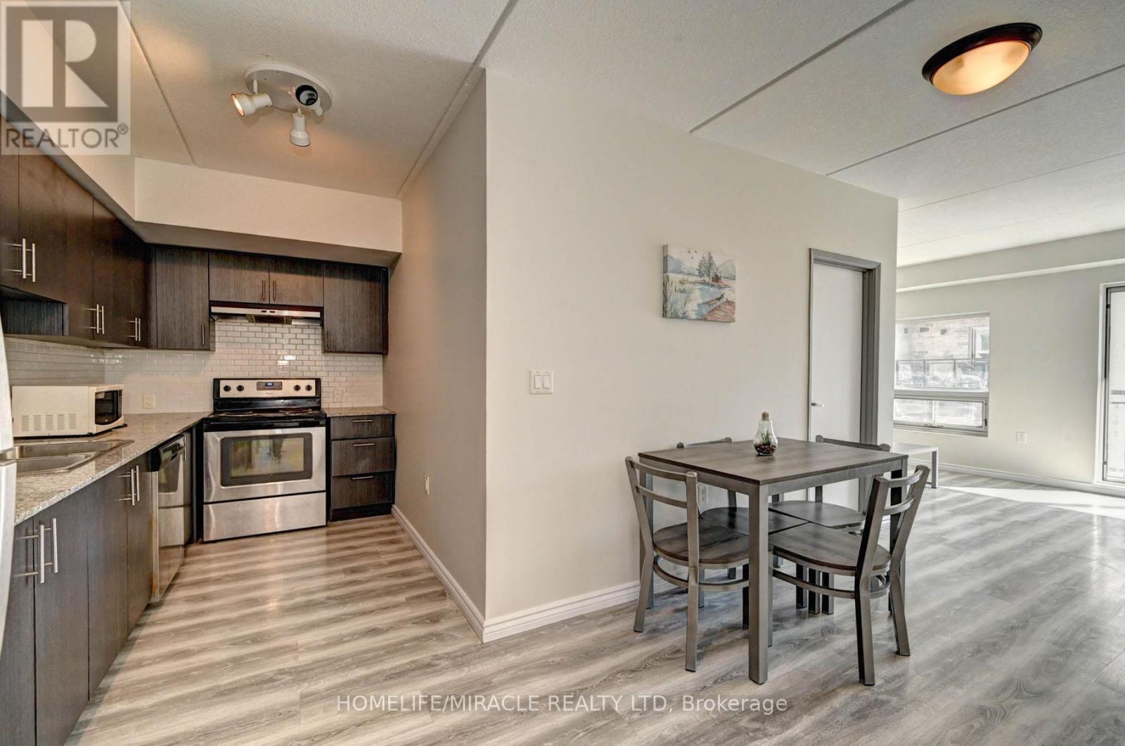 209F - 275 Larch Street, Waterloo, ON - Indoor Photo Showing Kitchen With Stainless Steel Kitchen