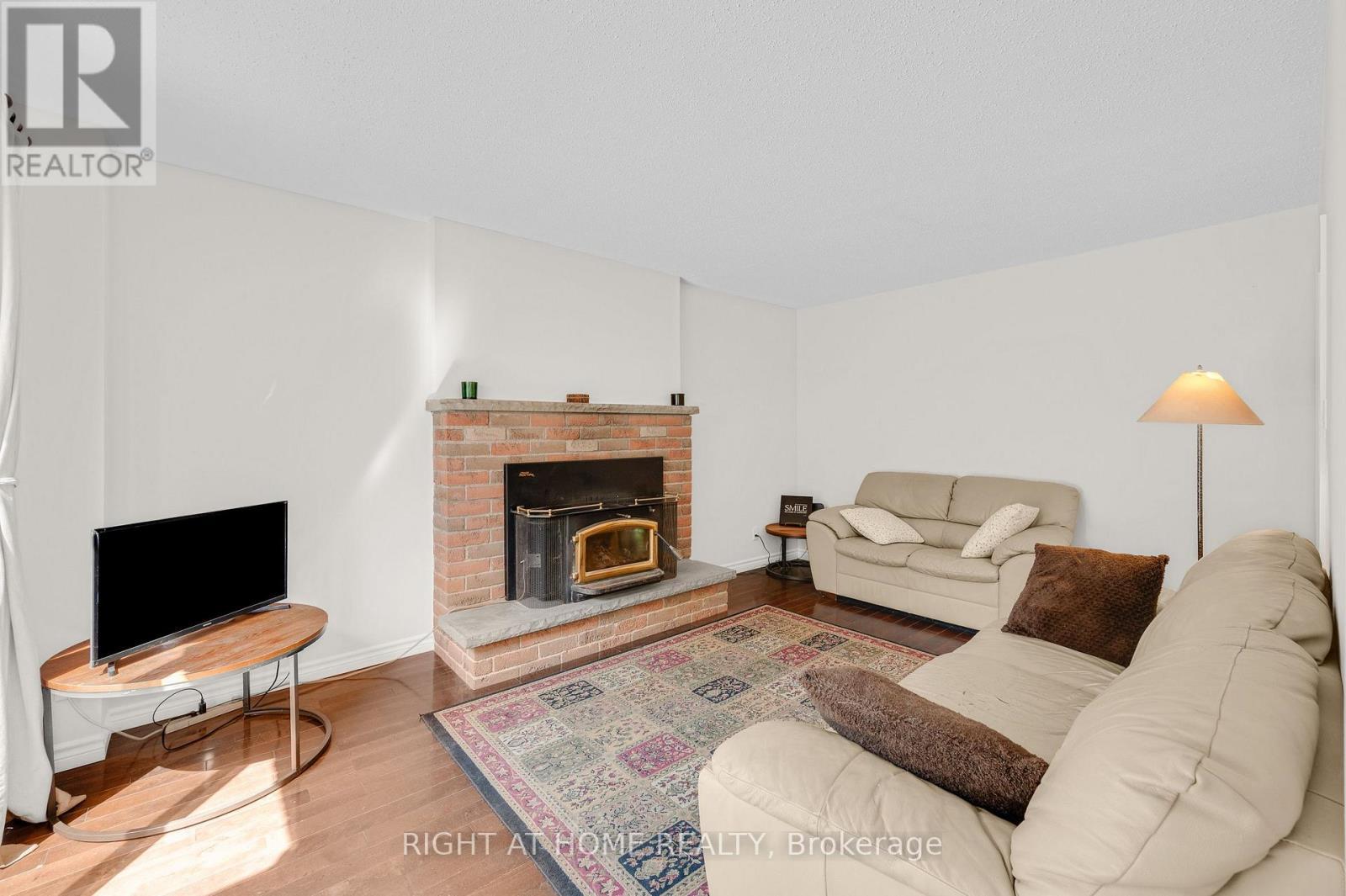 123 Benn Drive, Cambridge, ON - Indoor Photo Showing Living Room With Fireplace