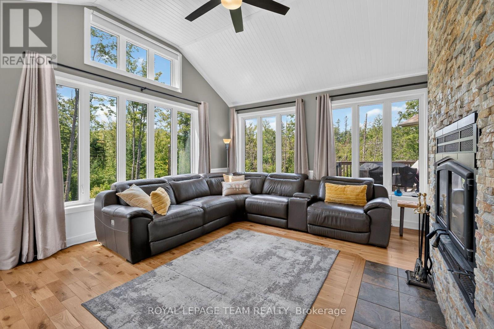 1830 Rollin Road, Clarence-Rockland, ON - Indoor Photo Showing Living Room With Fireplace