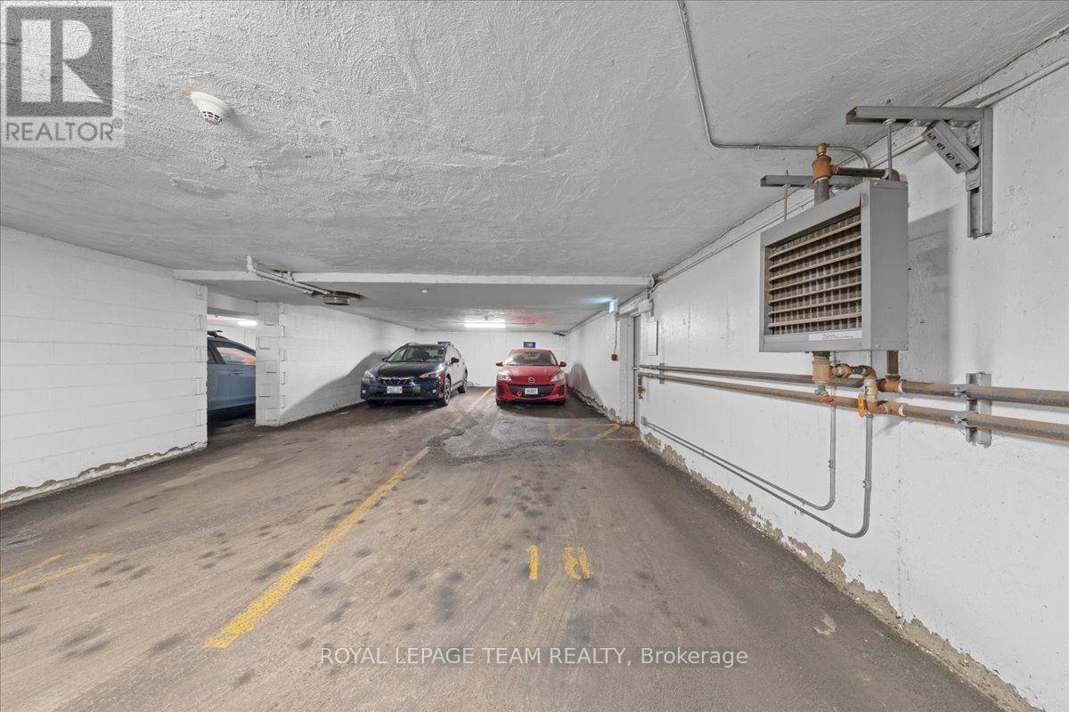 201 - 12 Corkstown Road, Ottawa, ON - Indoor Photo Showing Garage