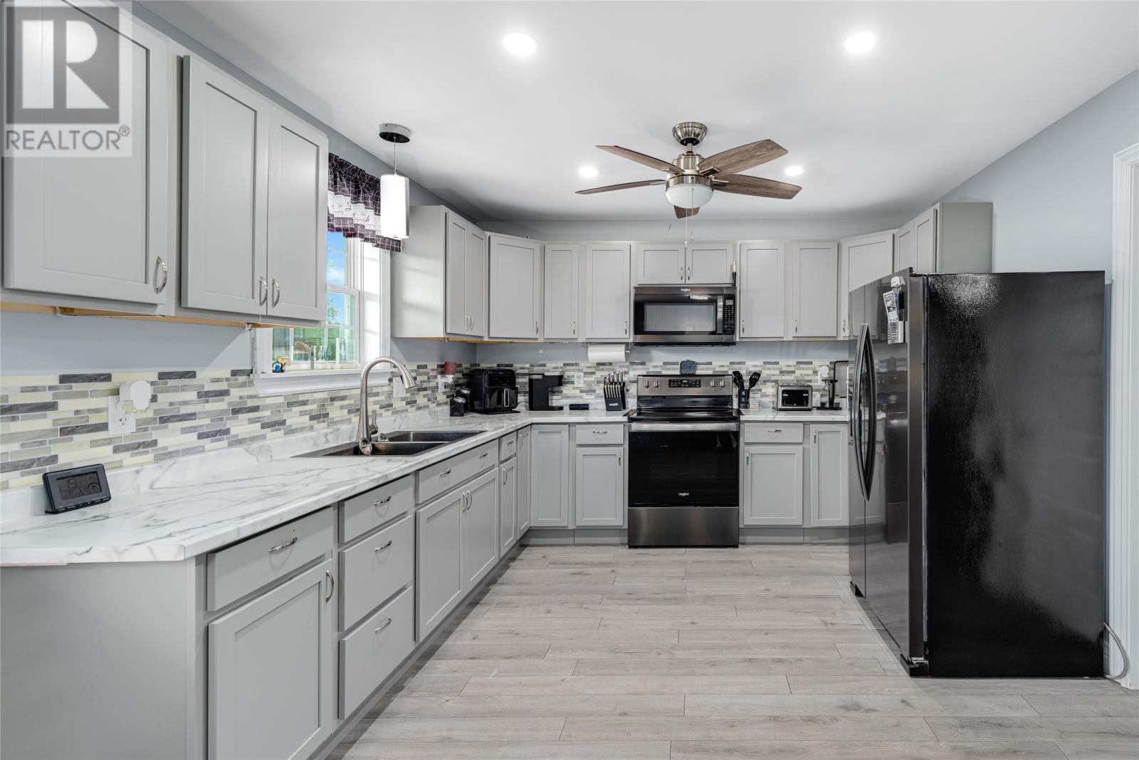 133 Station Road, Avondale, NL - Indoor Photo Showing Kitchen With Double Sink