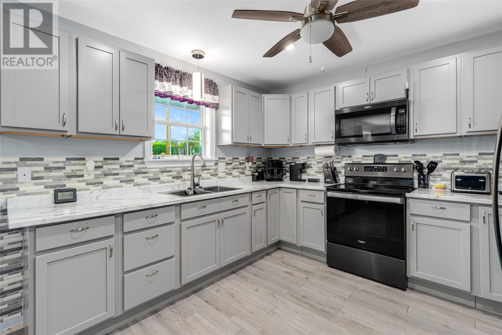 133 Station Road, Avondale, NL - Indoor Photo Showing Kitchen With Double Sink