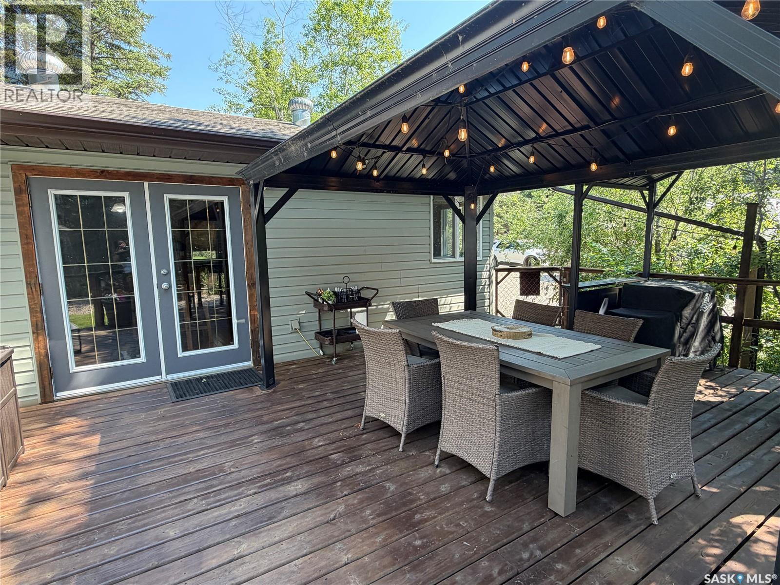 1306 Kewatin Lane, Turtle Lake, SK - Outdoor With Deck Patio Veranda With Exterior