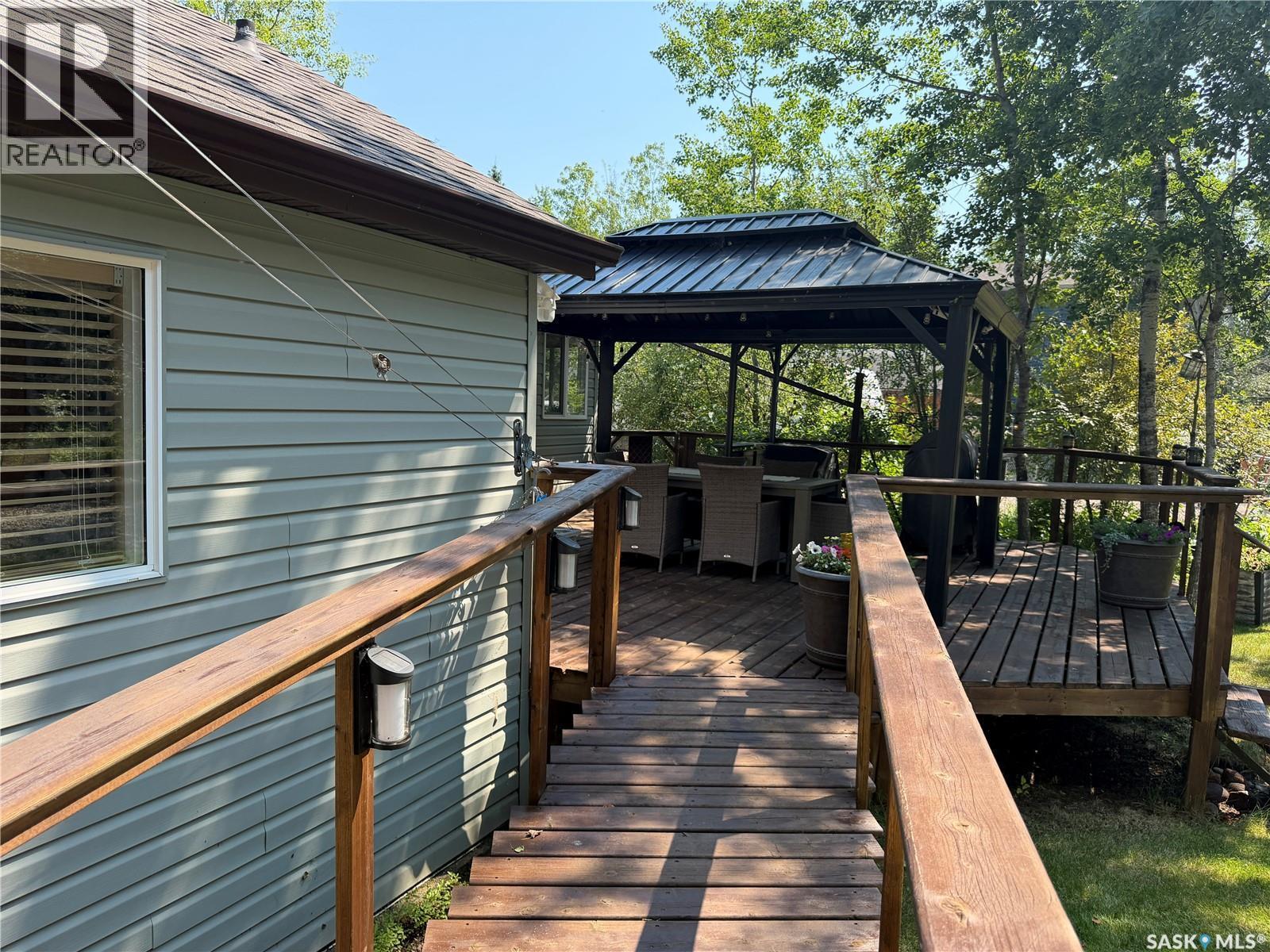 1306 Kewatin Lane, Turtle Lake, SK - Outdoor With Deck Patio Veranda With Exterior