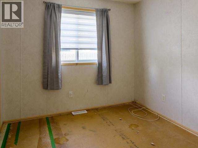 411-989 Range Road, Whitehorse, YT - Indoor Photo Showing Other Room