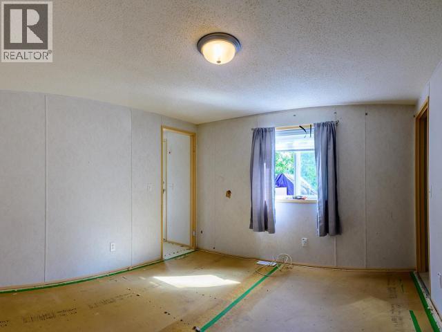 411-989 Range Road, Whitehorse, YT - Indoor Photo Showing Other Room